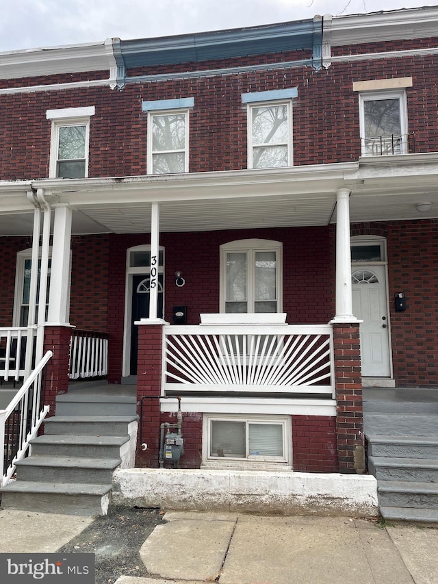 multi unit property featuring covered porch