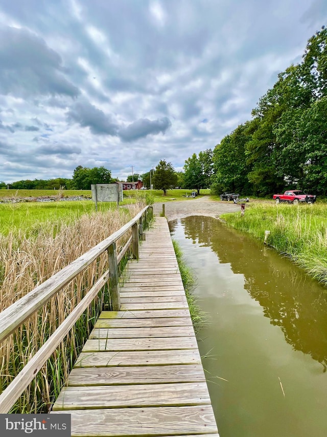 view of dock with a water view