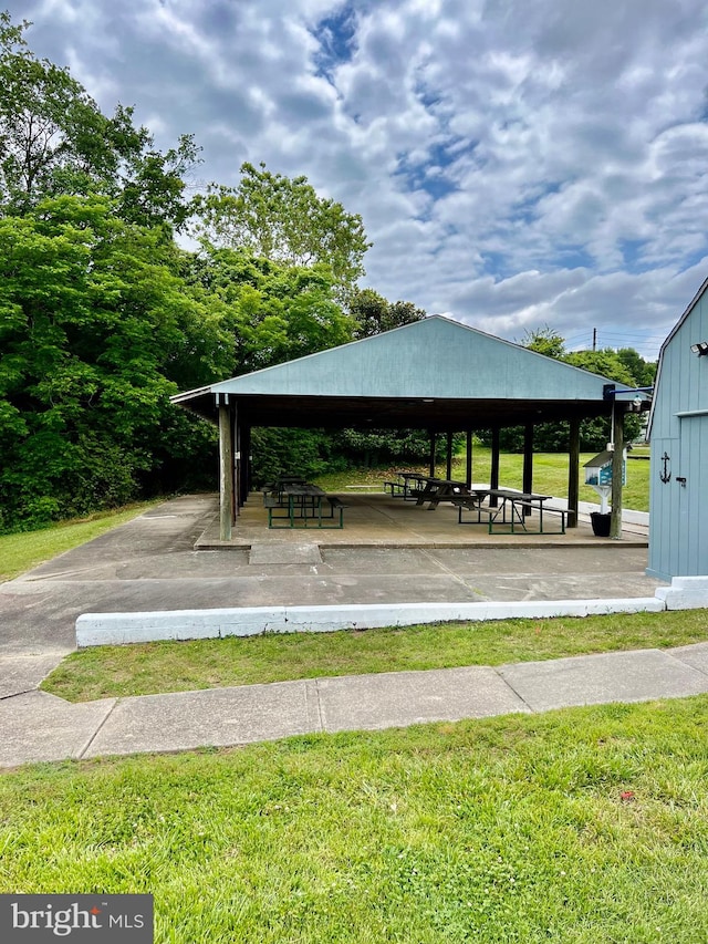 view of property's community featuring a yard and a gazebo