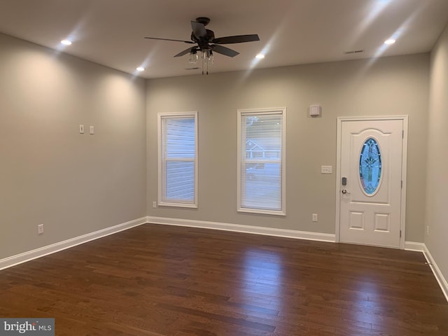 entryway with ceiling fan and dark hardwood / wood-style flooring