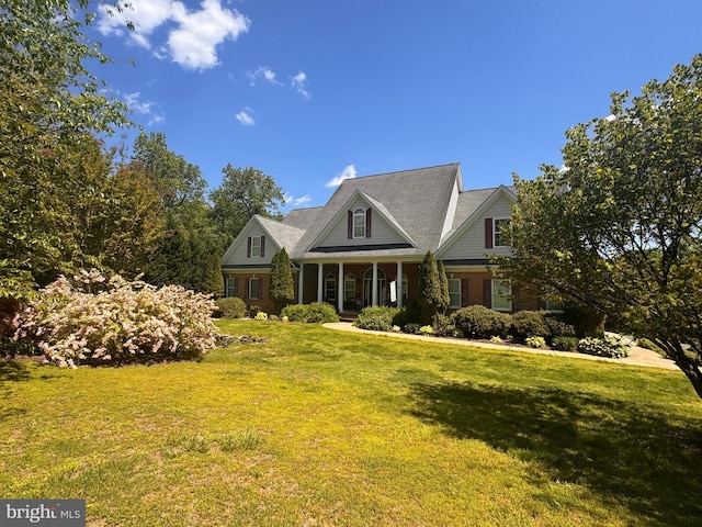 view of front of home with a front yard