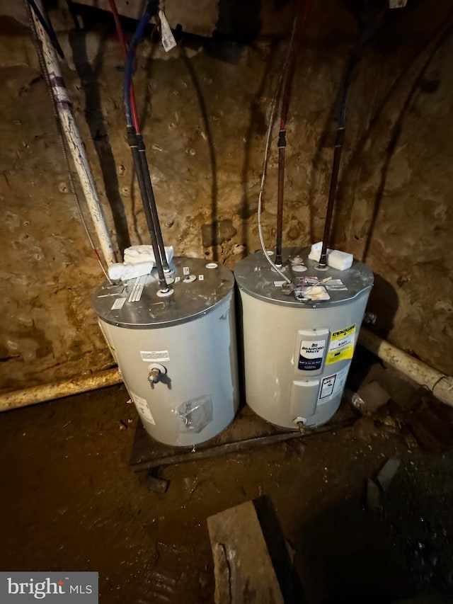 utility room featuring water heater