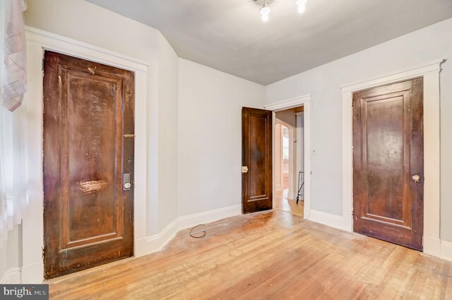 foyer entrance featuring light wood-type flooring