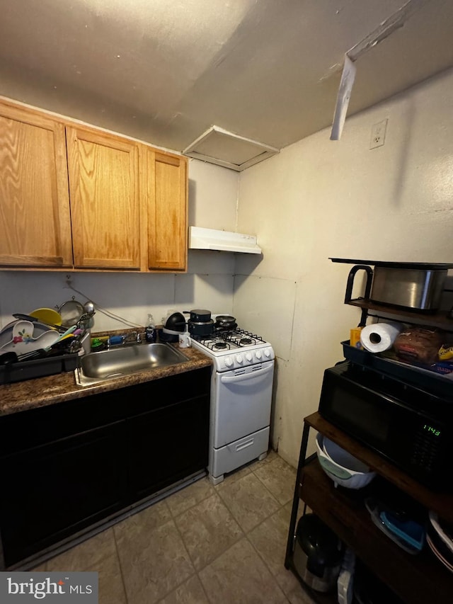 kitchen featuring white gas range oven