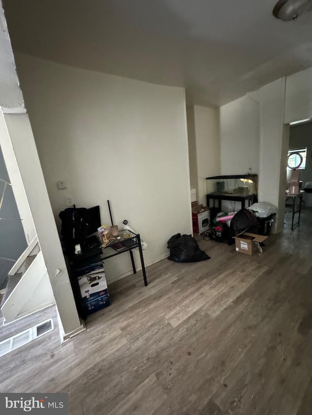 miscellaneous room featuring hardwood / wood-style floors