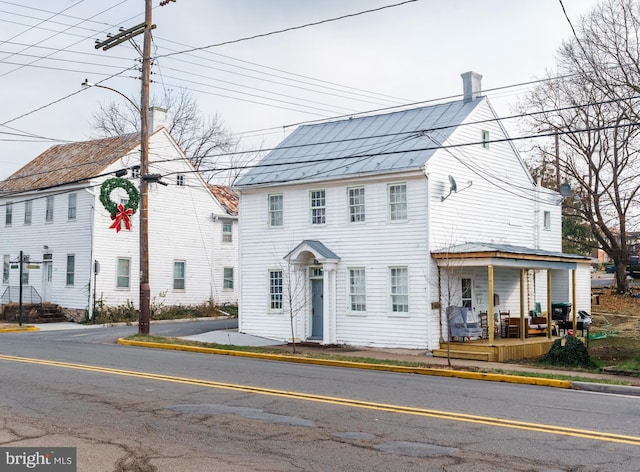 242 N Main St, Woodstock, VA 22664 - townhome / multi-family property featuring covered porch