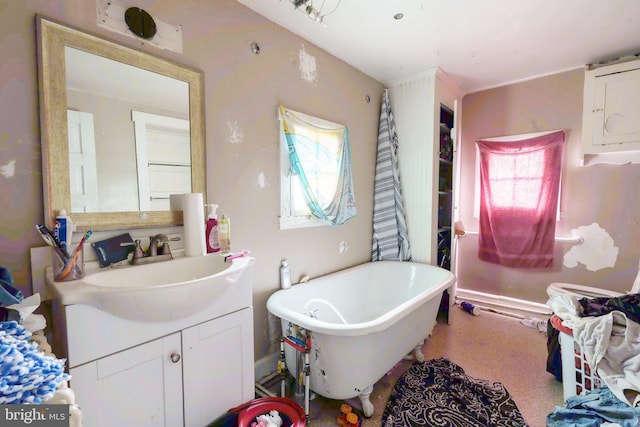 bathroom with a bathtub and vanity