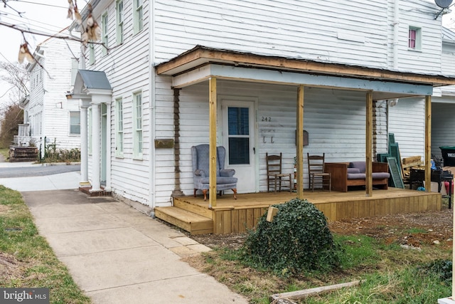 property entrance with a porch