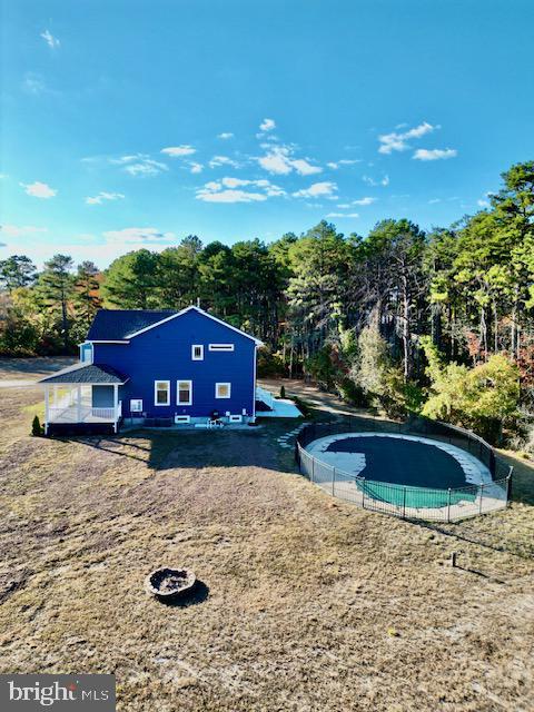 view of pool with a fenced in pool