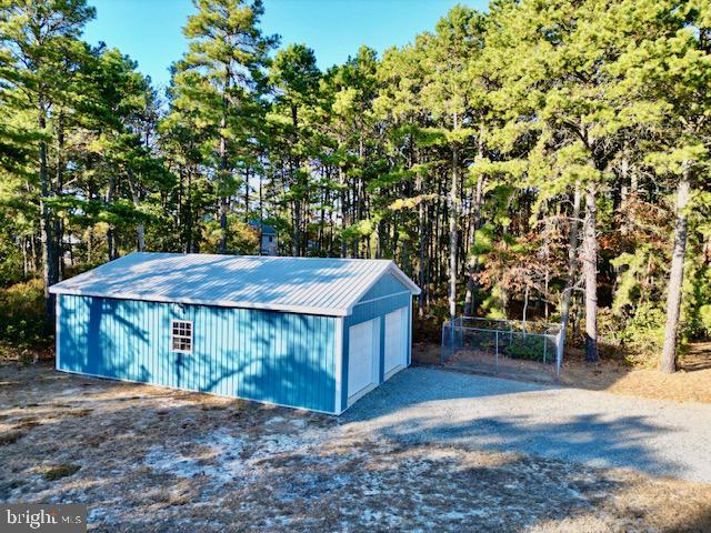 view of outbuilding featuring an outbuilding