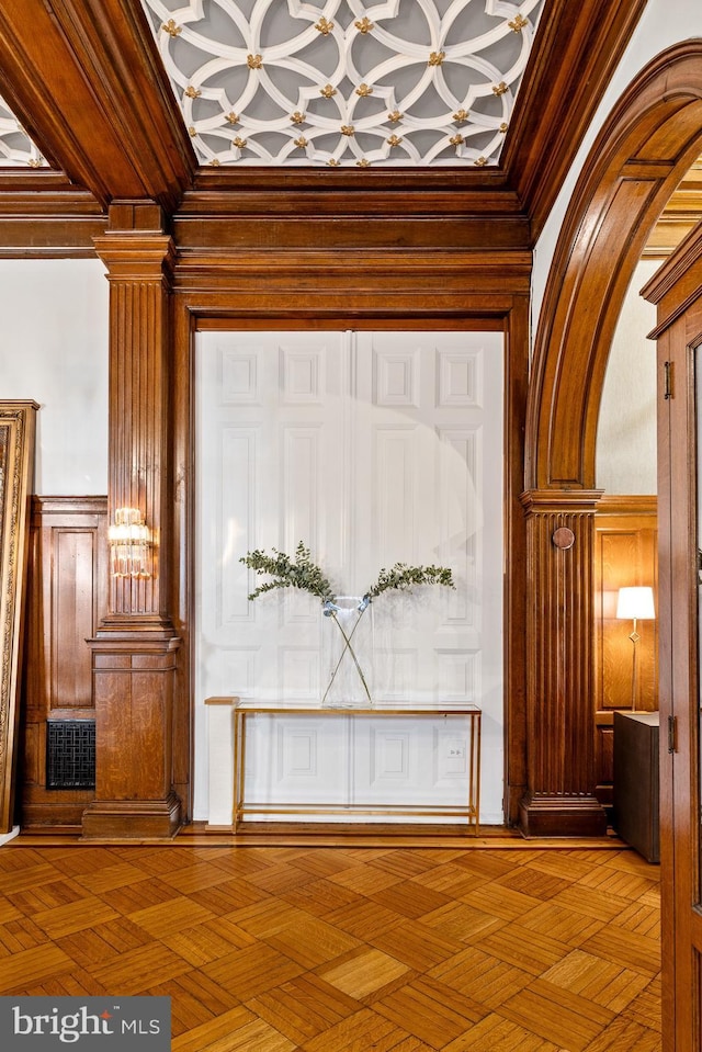 room details with parquet floors and crown molding