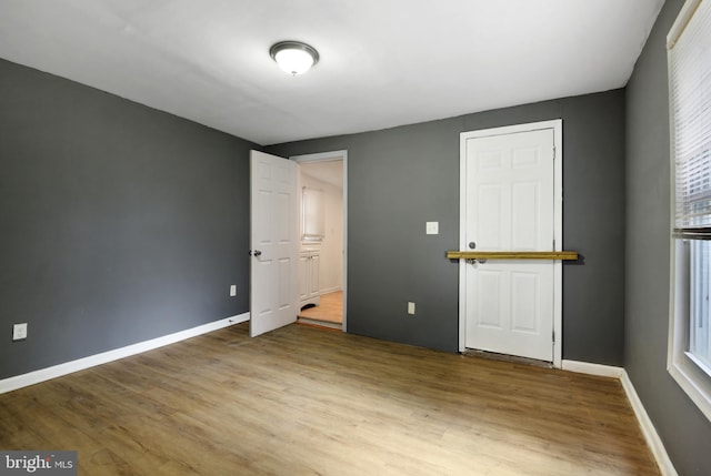 unfurnished bedroom featuring light hardwood / wood-style flooring