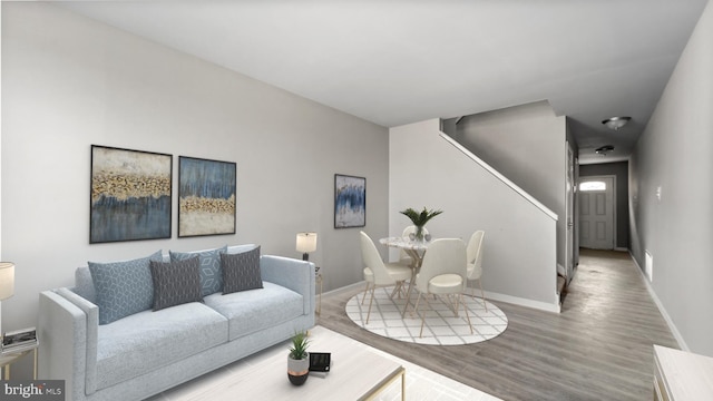 living room with wood-type flooring