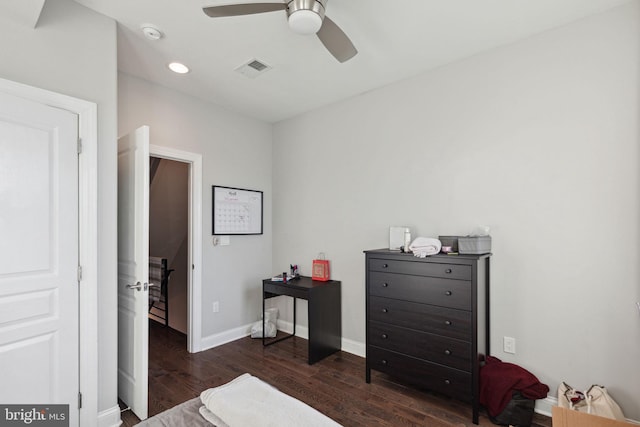 bedroom featuring ceiling fan and dark wood-type flooring