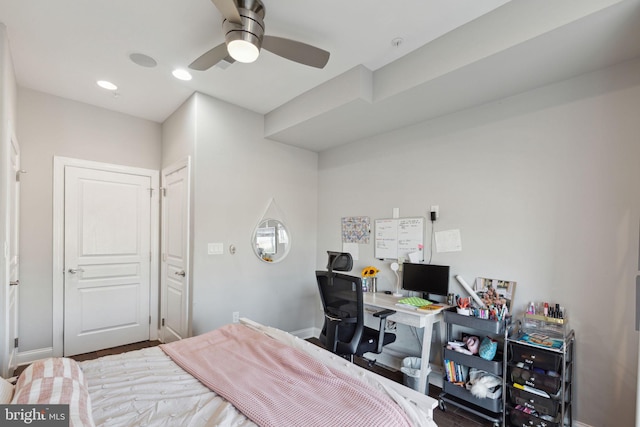 bedroom featuring ceiling fan and hardwood / wood-style flooring