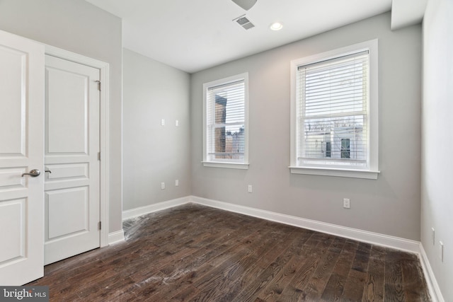 1922 S Lambert St, Philadelphia, PA 19145 - unfurnished bedroom with dark wood-type flooring and baseboards