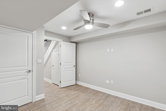 interior space featuring light wood-type flooring and ceiling fan