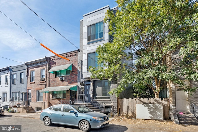 1922 S Lambert St, Philadelphia, PA 19145 - view of front of home with brick siding and fence