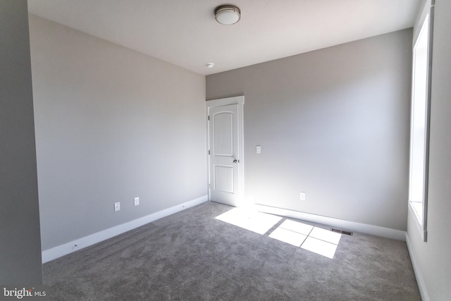 view of carpeted spare room