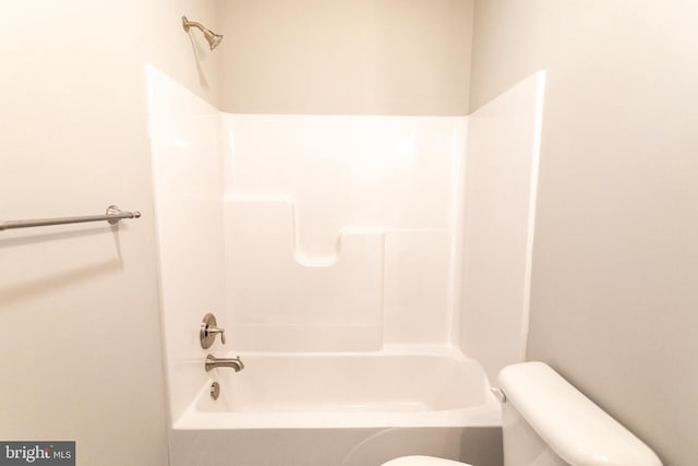 bathroom with  shower combination and toilet