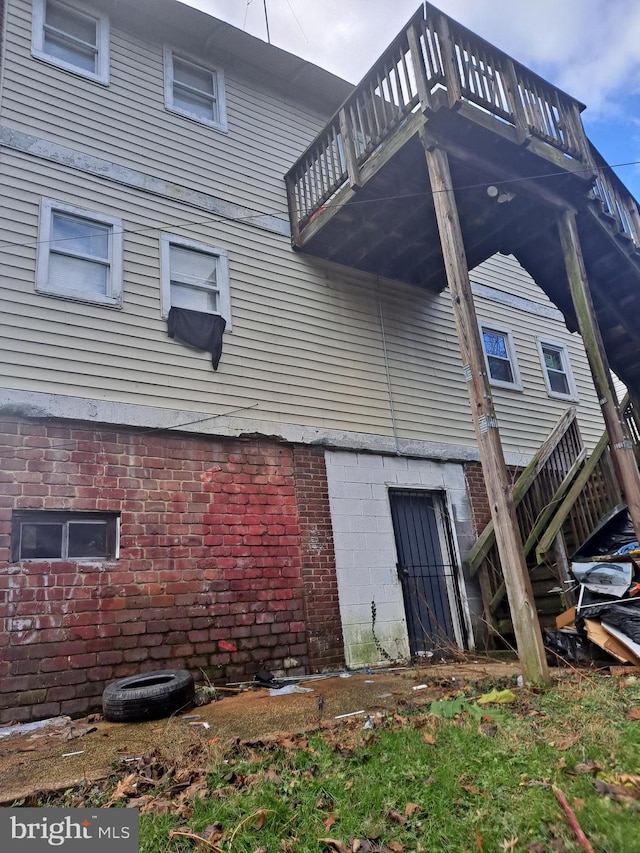 view of property exterior with a balcony