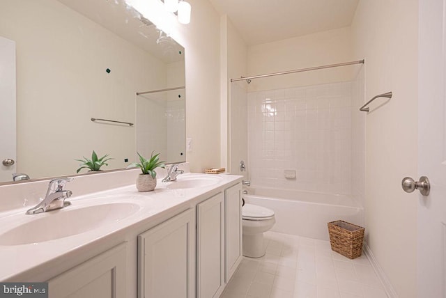 full bathroom with tile patterned flooring, vanity, shower / bathtub combination, and toilet