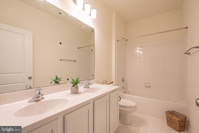 full bathroom featuring tile patterned floors, vanity, toilet, and bathing tub / shower combination