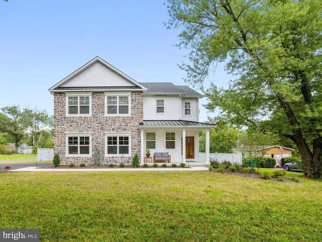 view of front of house featuring a porch and a front lawn