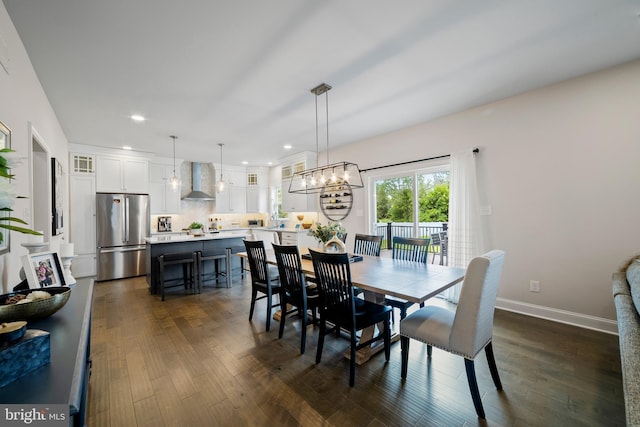 dining room featuring dark hardwood / wood-style flooring