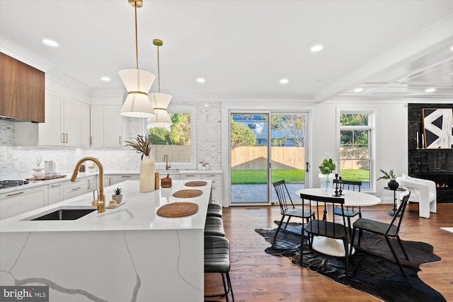 bathroom with crown molding and walk in shower