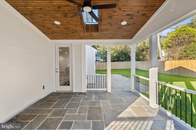 view of patio featuring ceiling fan