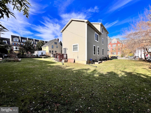 view of home's exterior with a lawn