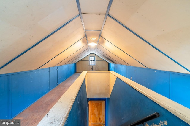 additional living space with vaulted ceiling