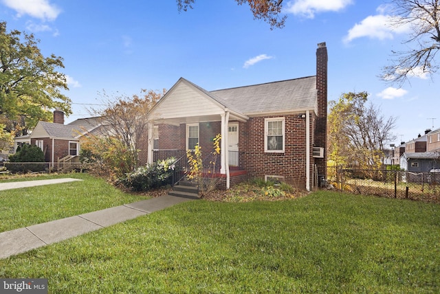 view of front facade with a front yard