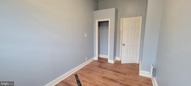 unfurnished bedroom with light hardwood / wood-style floors