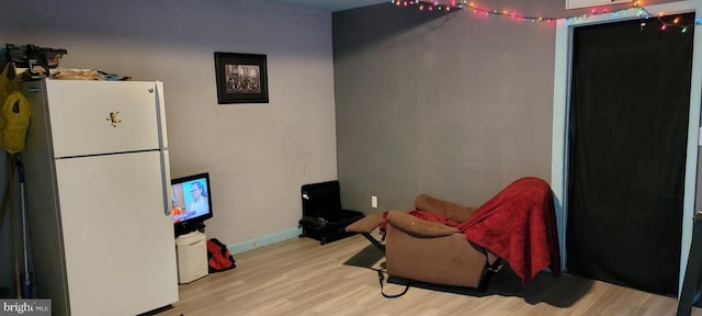 living area featuring light hardwood / wood-style flooring