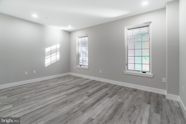 unfurnished room featuring light wood-type flooring