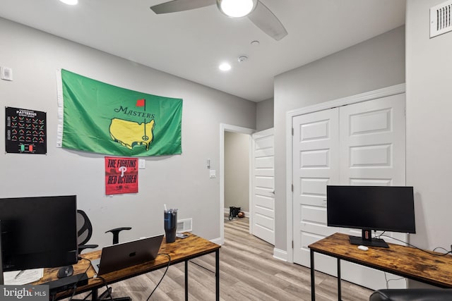 office area with ceiling fan and hardwood / wood-style floors