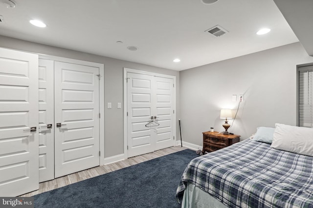 bedroom featuring light hardwood / wood-style floors