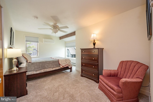 carpeted bedroom featuring a wall unit AC, ceiling fan, and a baseboard radiator