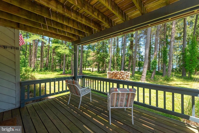 deck featuring a lawn