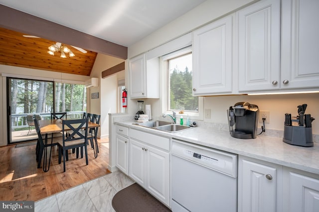 kitchen featuring vaulted ceiling with beams, dishwasher, sink, and white cabinets