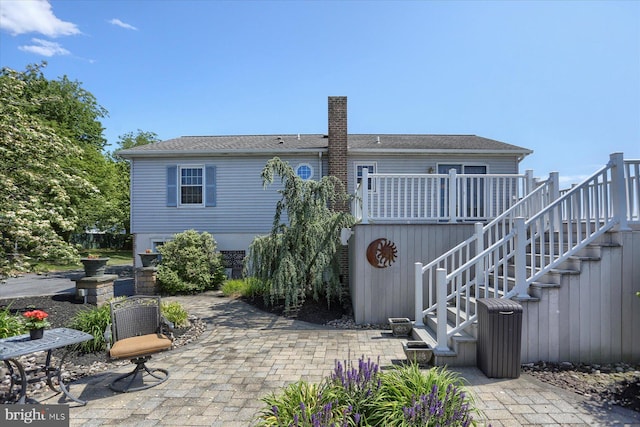 625 Brown Rd, Myerstown, PA 17067 - back of house featuring a patio area, stairway, a chimney, and a deck