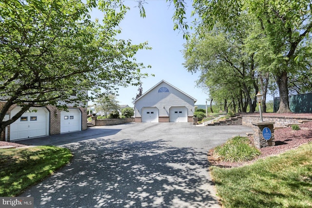 625 Brown Rd, Myerstown, PA 17067 - view of side of property featuring a detached garage and an outbuilding