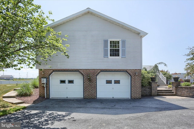 view of home's exterior with a garage