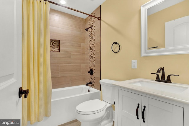 full bathroom with shower / bath combo, vanity, and toilet