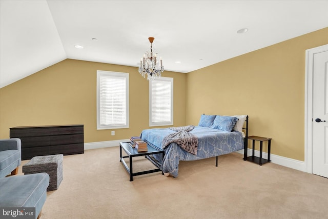 bedroom featuring light carpet, vaulted ceiling, and a notable chandelier