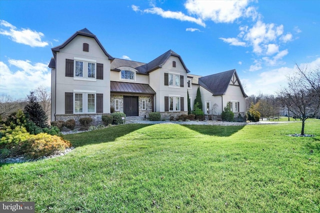 view of front of property with a front lawn