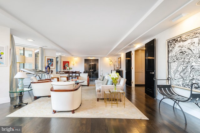 living room featuring dark hardwood / wood-style floors