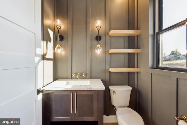 bathroom with vanity and toilet